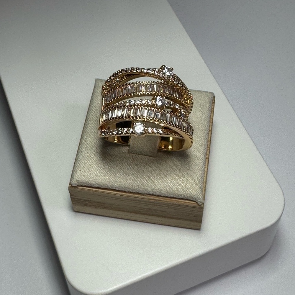 Elegant Gold tone with crystal detail ring size 10.